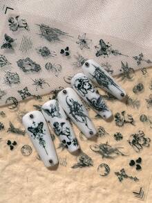 1张哥特复古主题美甲贴纸，精致神秘风格，包含天使、十字架、蝴蝶、心形、月亮、花朵、复古边框、藤蔓、细线条等元素，充满暗黑神秘的美感，适合DIY美甲和装饰，尤其适合喜欢暗黑、哥特、复古小众风格美甲的人士。 - 黑色 - 查看 8