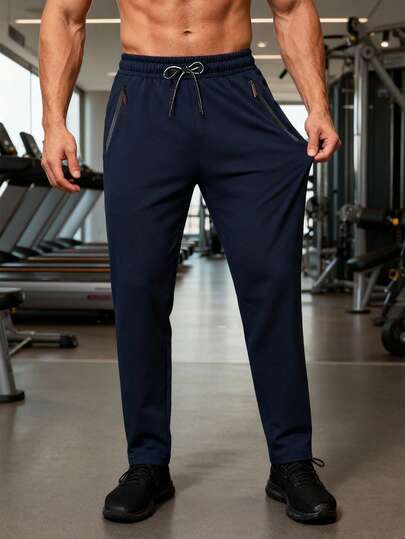 1 pieza Pantalones deportivos de hombre de ajuste relajado con cordón en la cintura, bolsillos con cremallera, tela transpirable, adecuado para fitness de verano, correr, baloncesto