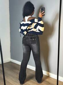 Jeans de campana estilo chic para oficina, talle medio con solapa, levanta glúteos - Negro - Ver 3