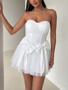 优雅白色无肩带修身迷你连衣裙，胸部饰有缝线和拉链细节，腰部两侧点缀大蝴蝶结，蓬松轻盈的薄纱裙摆——甜美性感又不失时尚感，是生日派对、约会之夜、周末花园派对、城市公园漫步的理想之选。 - 白色 - 查看 1