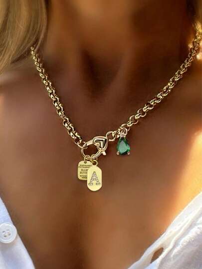 This STYLEVER Single Gold Letter Pendant Necklace, Paired With An Emerald Green Pendant And Stainless Steel Chain, Is Suitable For Wearing To Work, Daily Life, Parties, Banquets, And Balls. It Is A Unique And Luxurious Women's Necklace.