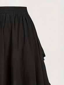 Falda midi negra de estilo gótico con volantes asimétricos, cintura elástica y vuelo, ideal para festivales de música, exhibiciones y salidas de verano, versátil y de línea A, para primavera - Negro - Ver 3