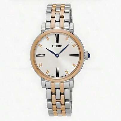 Seiko Reloj para damas clásico de acero inoxidable bicolor con cuarzo, manecillas azules, números romanos, elegante reloj de pulsera analógico. SFQ816J1
