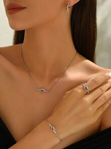 Bộ trang sức kim loại thắt nút thời trang gồm 1 dây chuyền, 1 vòng tay, 1 nhẫn và 2 bông tai. - Bạc - Xem 2
