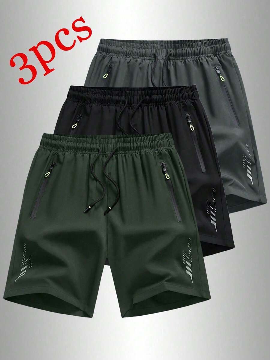 3 piezas Pantalones cortos deportivos casuales para hombres, de ajuste holgado y secado rápido con rayas reflectantes, bolsillos, cintura con cremallera y cordón, adecuados para fitness, correr y actividades al aire libre en verano