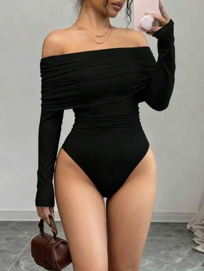 بودي سويت أسود كم طويل واسع الكتف، قماش مطاطي عالي الإطالة