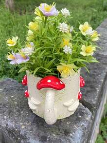 1个造型别致的蘑菇形树脂花盆，适合种植多肉植物和小盆栽，非常适合家居、办公室或花园装饰。 - 多色 - 查看 6