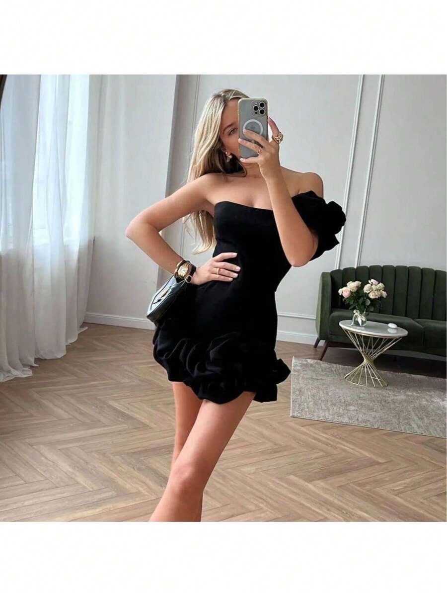 A Short, Fitted Dress With Irregular Ruffles And A Cinched Waist. - Black - View 1