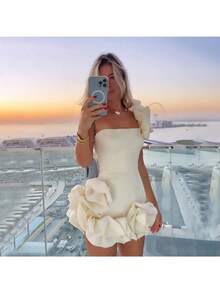 A Short, Fitted Dress With Irregular Ruffles And A Cinched Waist. - White - View 6