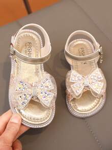 زوج جديد من الصنادل المسطحة الأنيقة للبنات، مزينة بالخرز واللؤلؤ والفصوص على شكل فيونكة، أصابع مستديرة، مناسبة للارتداء اليومي والرقص والخروج في الربيع والخريف، مزينة بترتر، أحذية أميرة مغلقة الأصابع - الذهبي - مشاهدة 11