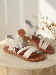 1 đôi dép xăng đan đế bằng mùa hè cho trẻ em, quai thun, mũi tròn hở, phối màu, kiểu dáng tối giản, đa năng, phù hợp cho bãi biển, kỳ nghỉ và sử dụng hàng ngày. - Màu be - Xem 6