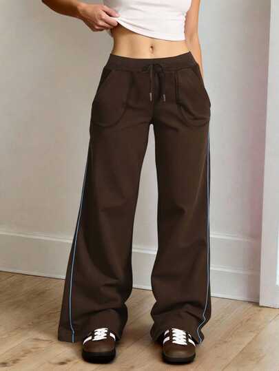 女士休闲直筒抽绳运动裤，宽松版型，适合海滩、运动、办公、居家、街头穿着，春、秋、冬三季皆宜，也适合毕业季、返校季、女教师等场合，撞色设计，舒适百搭。
