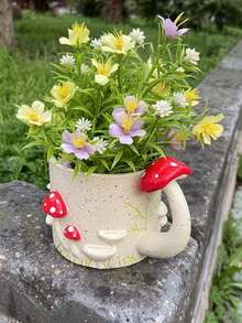 1个造型别致的蘑菇形树脂花盆，适合种植多肉植物和小盆栽，非常适合家居、办公室或花园装饰。 - 多色 - 查看 4