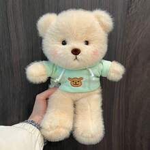 这款9.84英寸的超柔软米色毛绒泰迪熊采用如云般柔软亲肤的面料制成。它穿着浅绿色连帽衫，上面印有可爱的泰迪熊图案，黑色的圆眼睛和柔和的粉色腮红更添迷人魅力。 - 彩色 - 查看 12