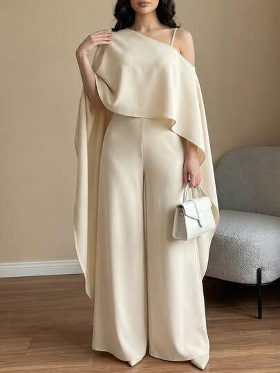 Mono de pierna ancha con tirantes finos, hombros oblicuos y mangas tipo capa en color beige para mujer, elegante para fiestas de noche, bodas y ocasiones formales