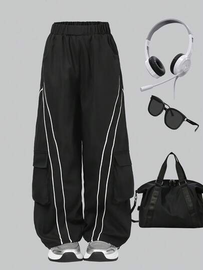 男童侧条纹黑色休闲裤，工装裤，街头风运动裤，适合度假、运动和旅行