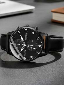 三件套奢华商务男士腕表套装，包括一枚黑色表盘多功能石英腕表（配黑色皮表带）、一个黑色压纹皮夹和一个金属钢笔。整体风格沉稳优雅，散发着成熟稳重的气质。 - 黑色 - 查看 5