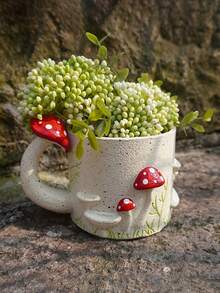 1个造型别致的蘑菇形树脂花盆，适合种植多肉植物和小盆栽，非常适合家居、办公室或花园装饰。 - 多色 - 查看 7