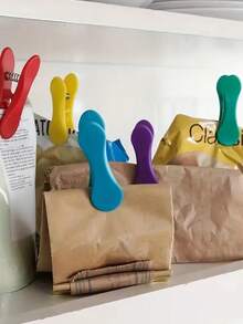 8 piezas Clip de colores de macarrón para sellar alimentos, pinzas de ropa, clip de almacenamiento de alimentos resistente, clip reutilizable para bolsas de aperitivos, clip multiusos portátil para sellar alimentos, clip para bolsas de plástico, clip de dibujos animados con asa, a prueba de humedad y polvo, para bolsas de pan, bolsas de aperitivos, bolsas de alimentos, bolsas de plástico, té, leche en polvo, ayudante de almacenamiento, adecuado para el hogar - Multicolor - Ver 3