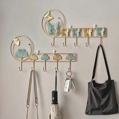 خطاف حائط على شكل فراشة من الحديد، منظم للملابس والمفاتيح للغرفة والحمام والمطبخ - ديكور يدوي جمالي، حل تخزين فاخر وموفر للمساحة، تعليق حائطي أنيق للقبعات والحقائب والمفاتيح والمجوهرات والاكسسوارات، تنظيم منزلي عصري أنيق، تشطيب معدني متين، تركيب سهل، حل للتقليل من الفوضى في غرفة المعيشة والممر والمدخل، أسلوب هدية ملهم للديكورات الداخلية المعاصرة