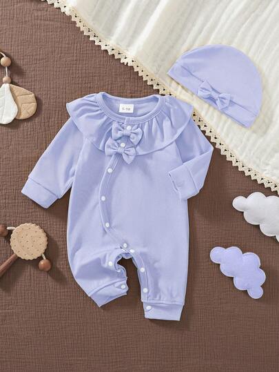 女婴柔软透气连体衣，粉色，圆领，长袖，荷叶边装饰，双蝴蝶结点缀，单排扣设计，四季皆宜