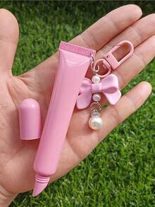 Lippenglossspender mit Schlüsselanhänger Fliege mit Perlenanhänger, nachfüllbarer Lippenglossspender, leere Puder Foundation Concealer Verpackung, weiche Lippenglosstube zum Zusammendrücken, multifunktionaler Lippenstift Nachfüllbehälter, zusammendrückbare weiche Tube, Must-Have für Modebewusste, einzigartiges Geschenk für Freundin, Geliebte, Braut, Brautjungfer, Familie, geeignet für Reisen, Valentinstag & Festtagsgeschenke - Verschiedenfarbig - Übersicht 14