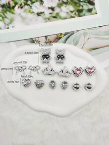 14 piezas Accesorios de lujo estilo Y2K para decorar zapatos: corona de oso plateada, dijes de resina, adornos con strass y lazos, hebillas para zuecos, clips con forma de corazón, decoraciones para sandalias, bolsas de playa y talla grande. Ideal para regalos de Navidad, Halloween, cumpleaños y fiestas. - Multicolor - Ver 11
