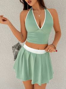 abyoxi Women's Mint Green With White Trim, Halter Neck Deep V, Backless Lace-Up Short Top And High Waisted A-Line Pleated Skirt 2 Piece Set, Casual Vacation, Young Hot Spice Girls, Sweet And Sexy, Party, Date, Seaside And Beach, Spring Summer Crop Tops And Mini Skirt Outfit - Pea Green - View 1