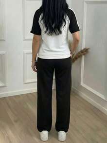 女士新款翻领半拉链撞色短袖上衣搭配松紧腰宽松纯色长裤两件套，春夏黑色 - 黑色 - 查看 4