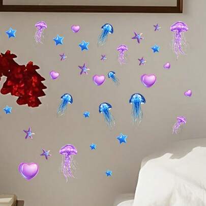 Blue Glow-In-The-Dark Decorative Stickers With Marine Life Themes, Featuring Purple & Blue Jellyfish, Purple Starfish, Blue Pentagram, And Purple Hearts. Dreamy, Cute, And Soft-Toned Style, Suitable For Decorating Living Room, Bedroom, And Study.