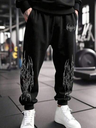 Hombre006 Manfinity Sport Corelite Pantalones de chándal casuales con estampado gótico, cintura con cordón y bolsillos para hombre_1