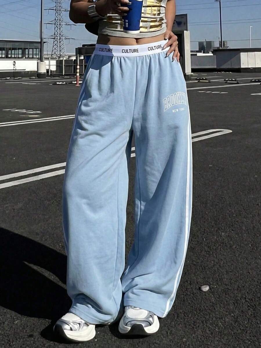 UREREM 女士休闲时尚街头运动学院风字母松紧腰撞色条纹侧边宽松喇叭裤 - 淺藍色 - 查看 1