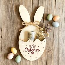 1 món đồ trang trí bằng gỗ hình thỏ Phục Sinh, có túi để đựng quà, khắc dòng chữ "Frohe Ostern" (Chúc mừng Lễ Phục Sinh). Hoàn hảo để làm vật trang trí trung tâm cho bàn ăn tối Lễ Phục Sinh, và thích hợp để trang trí trong văn phòng, lớp học, các bữa tiệc và các sự kiện trong nhà hoặc ngoài trời. Phụ kiện hình thỏ, quà tặng Lễ Phục Sinh. - Nhiều màu - Xem 2