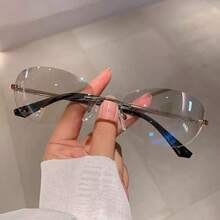 New Fashion Retro Frameless Oval Hot Girl Street Style Sunglasses Y2k Metal Futuristic Style Small Frame High-End Sunglasses - 無色 - 查看 4