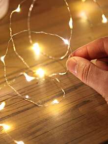 Guirlandes lumineuses en fil de cuivre à LED, alimentées par batterie, non conductrices, multicolores. Ces petites guirlandes décoratives sont parfaites pour Halloween, Noël, la Saint-Valentin et les célébrations de mariage, ainsi que pour la décoration printanière, le jardin, les lumières de jardin de fées, la décoration de chambre, les demandes en mariage et les décorations de mariage. - Multicolore - Voir 2