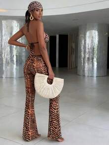 Bộ bikini nữ gợi cảm họa tiết da báo với quần bơi xuyên thấu buộc dây, chất liệu co giãn cao, thích hợp cho kỳ nghỉ hè thanh lịch trên bãi biển. - màu nâu - Xem 5