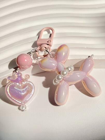 1 件新款创意气球狗，配有心形皇冠设计，适用于包包、钱包、汽车钥匙扣、学生背包挂饰，是送给朋友的理想节日礼物。