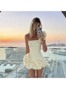 A Short, Fitted Dress With Irregular Ruffles And A Cinched Waist. - White - View 3