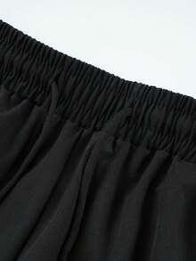 Pantalones cortos para hombres, pantalones cortos informales y transpirables con estampado de color de contraste en patchwork, pantalones cortos hasta la rodilla, pantalones deportivos de secado rápido con cordón para exteriores - Negro - Ver 5