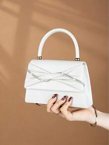 REMANLAND 这款优雅时尚的蝴蝶结手拿包，奢华迷人，优雅精致，适合女性出席派对和婚礼，也适合女孩、女士、大学生、年轻职业女性和上班族。这款手拿包是派对、舞会和婚宴的理想之选，也是送给女性的完美礼物。 - 白色 - 查看 4