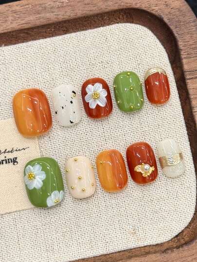 10pcs Pure Handmade Press On Nails Short Nails Oval Nails The Color Scheme Mainly Consists Of Warm Tones Of Orange-Red, Gradient Orange-Yellow And Avocado Green, With Clean Beige And Milk White As The Base Colors. The Color Combination Is Vibrant And Warm. There Are Also Hand-Painted Small Flowers And Metal Lines Handmade Press On Nails