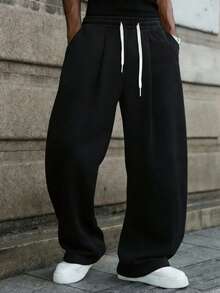 Pantalones casuales de pierna ancha con cordón en la cintura, corte holgado para hombre - Negro - Ver 1