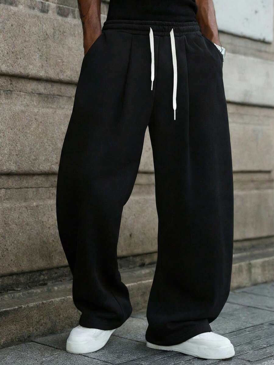 Pantalones casuales de pierna ancha con cordón en la cintura, corte holgado para hombre - Negro - Ver 1