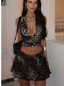 Conjunto de top sin mangas y minifalda con estampado de leopardo para mujer, lindo conjunto de vacaciones con espalda descubierta y lazo, negro de verano - Negro - Ver 9