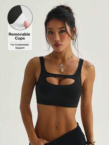 Áo ngực thể thao nữ màu trơn, có đệm mút tháo rời, kiểu dáng racerback. - màu đen - Xem 1