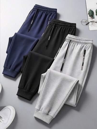 男士休闲街头裤，带抽绳和拉链口袋，适合街头时尚、工作通勤或作为春季礼物送给丈夫。