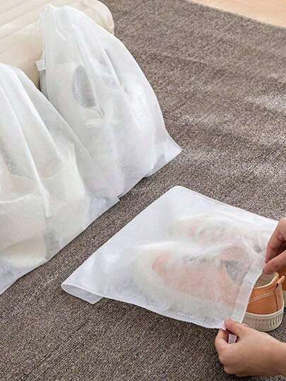 50 piezas/Set Bolsas de tela no tejida para zapatos, bolsas de viaje a prueba de polvo con cordón simple en blanco para organización, almacenamiento ligero, protectores de armario y equipaje, equipo de hogar y viaje para zapatos, portátil y plegable, barrera contra el polvo, ideal para viajes familiares, viajes de negocios, vacaciones y escapadas de fin de semana, accesorios de viaje que ahorran espacio