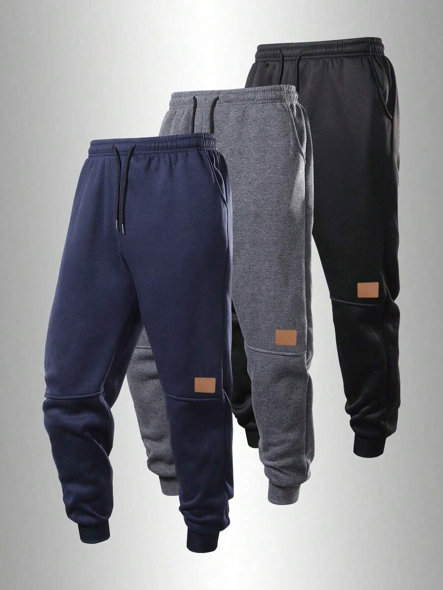 Men's All-Season Sports Jogging Pants With Adjustable Drawstring, Side Pockets And Patch Logo Design, Suitable For Gym And Running - Navy Blue - View 1