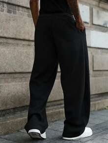 Pantalones casuales de pierna ancha con cordón en la cintura, corte holgado para hombre - Negro - Ver 2