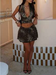 Conjunto de top sin mangas y minifalda con estampado de leopardo para mujer, lindo conjunto de vacaciones con espalda descubierta y lazo, negro de verano - Negro - Ver 10
